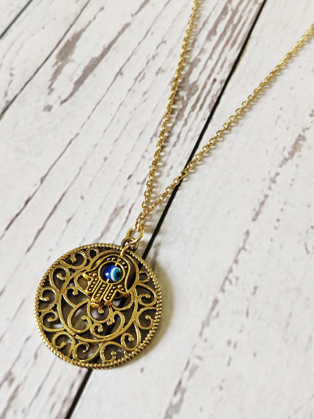 EL REGALO Women Gold Toned & Blue Bohemian Necklace - for Women and Girls
Style ID: 16926706