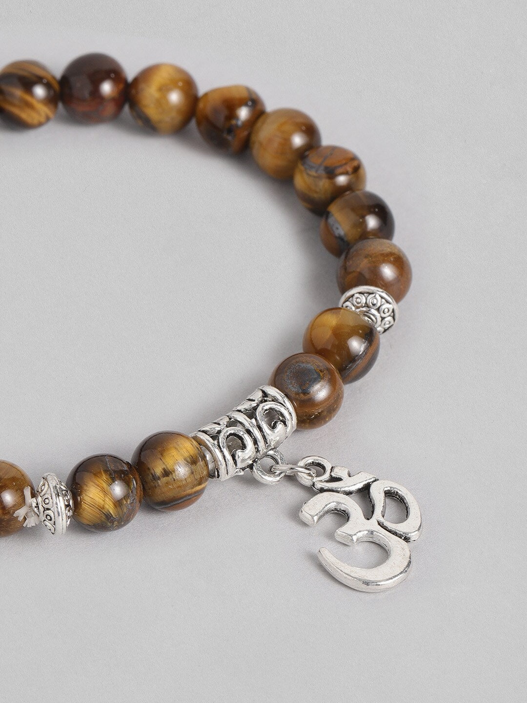 EL REGALO Men Brown & Silver-Toned Handcrafted Om Elasticated Charm Bracelet - for Men
Style ID: 16186550