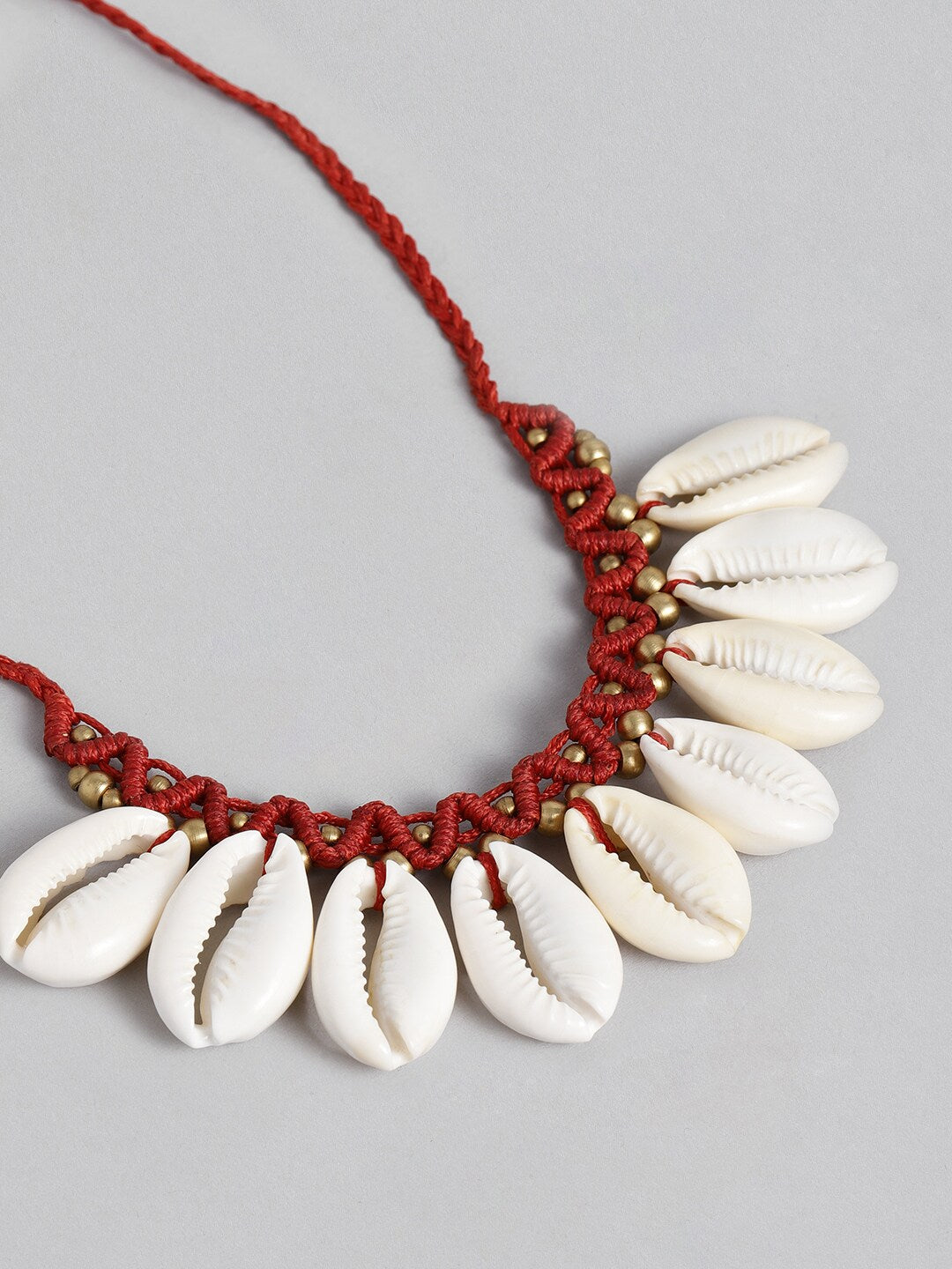 EL REGALO Maroon & Beige Big Cawrie Bohemian Necklace - for Women and Girls
Style ID: 16216046