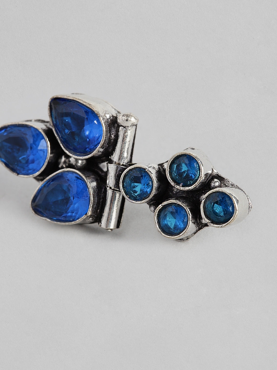 EL REGALO Blue & Silver-Toned Seven Stone Studs Earrings - for Women and Girls
Style ID: 16287446