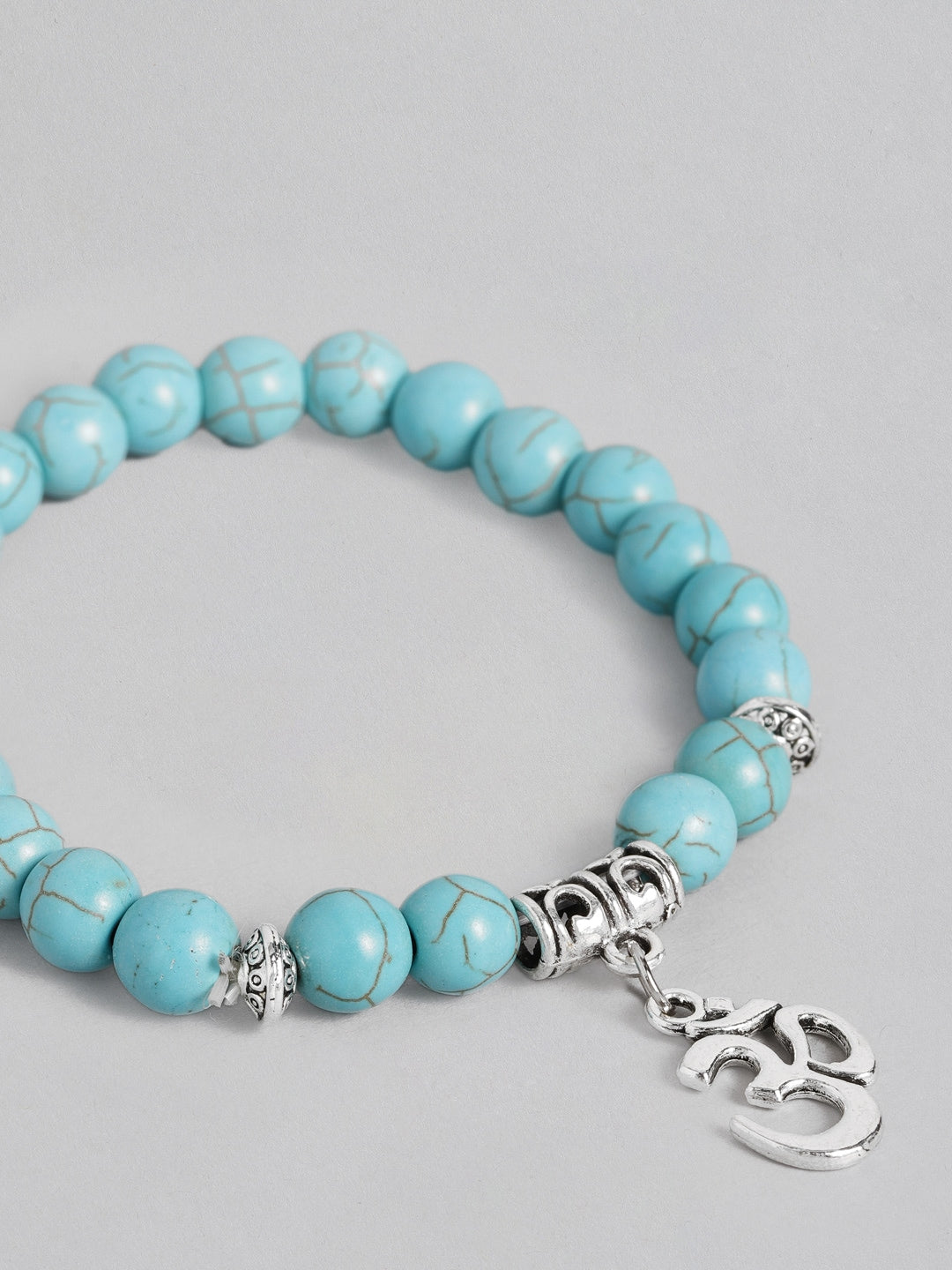 EL REGALO Men Turquoise Blue & Silver-Toned Handcrafted Om Elasticated Charm Bracelet - for Men
Style ID: 16186548